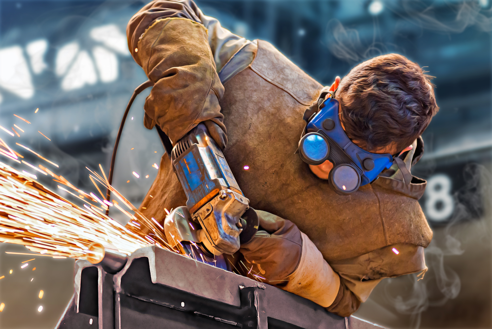 Industrial worker using an angle grinder with sparks flying for a commercial digital signage marketing video production. 